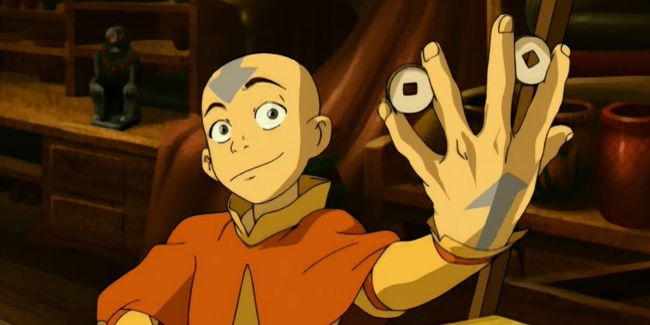 آنگ در Avatar The Last Airbender با لبخند و سکه های در دست، انیمیشن بدون قسمت بد