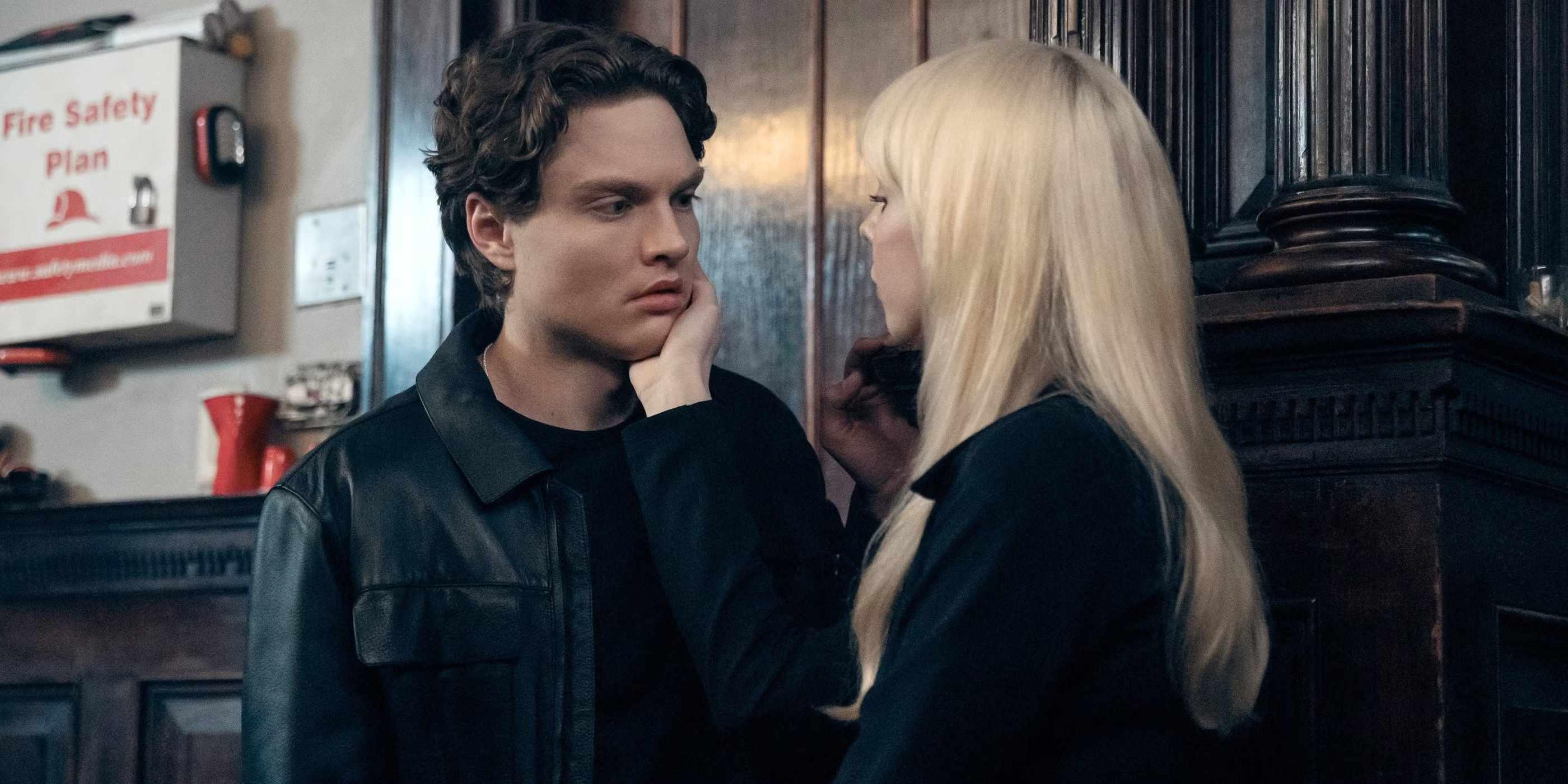 Cate (Maddie Phillips) touching Sam's (Asa Germann) face as they look at one another, a moment hinting at Gen V Season 2 رستگاری Cate