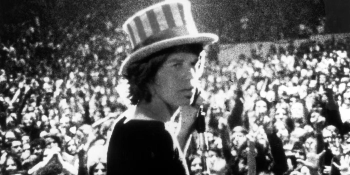 میک جَگر در کنسرت Gimme Shelter - Peacemaker Superman ایستر اگ