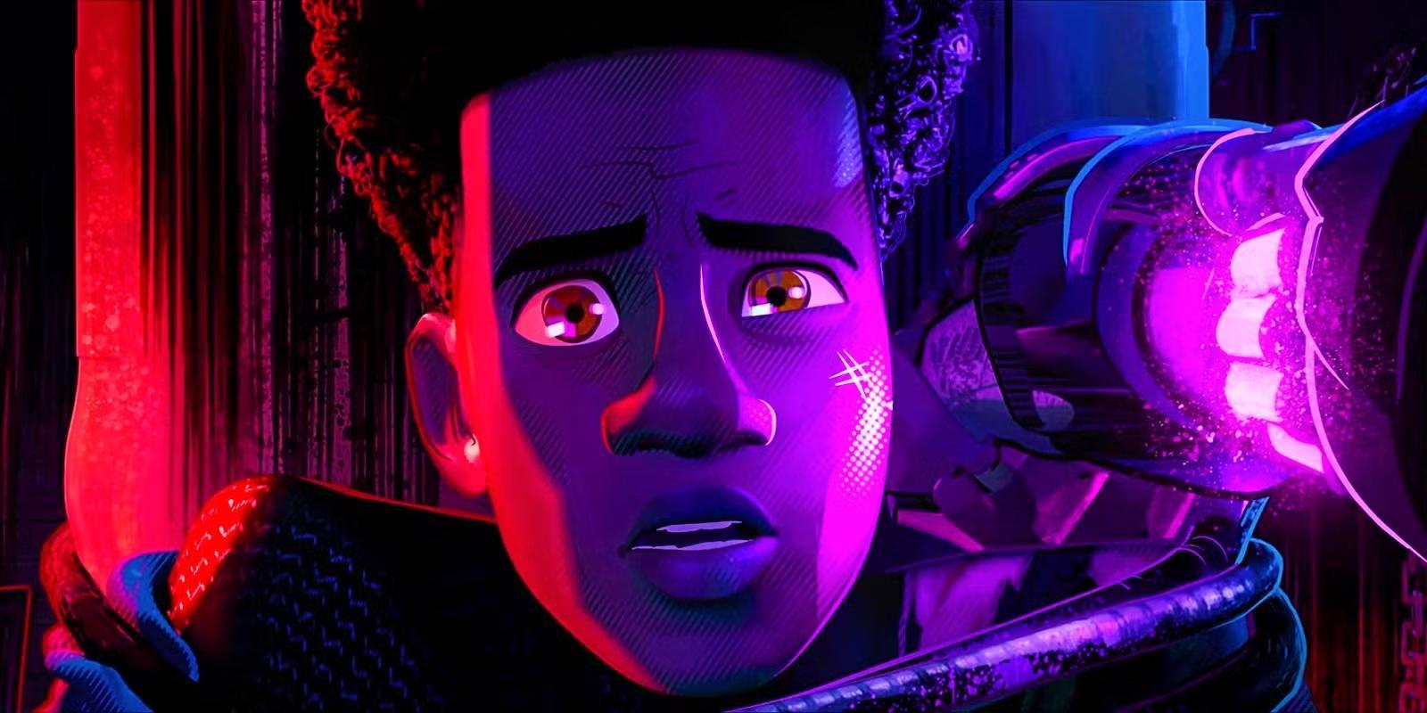 Miles Morales Tied To A Punching Bag With The Prowler's Fist Next To His Head In Spider-Man Across the Spider-Verse - رقابت Spider-Man و Pixar