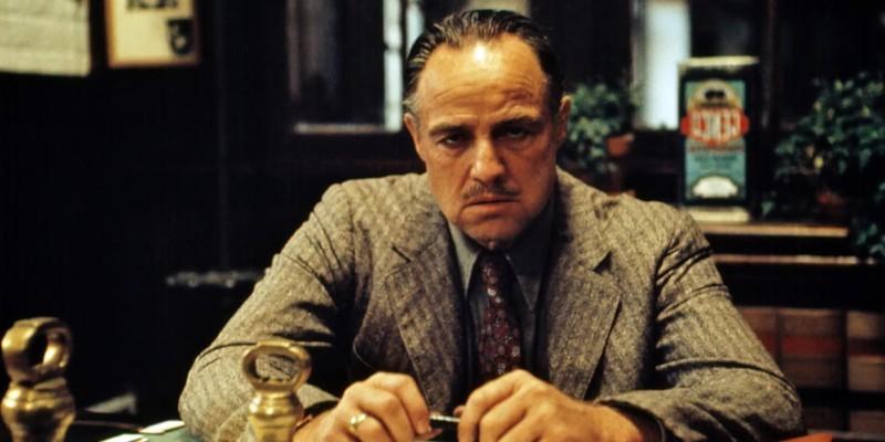 Marlon Brando as Don Corleone looking intense in The Godfather - فیلم گانگستری برای شروع