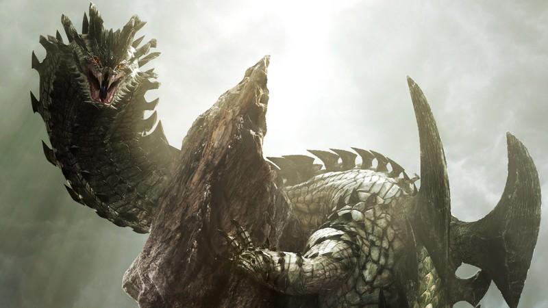 A giant dragon gripping the side of a mountain in Monster Hunter 4 Ultimate, از بهترین بازی های Nintendo 3DS.