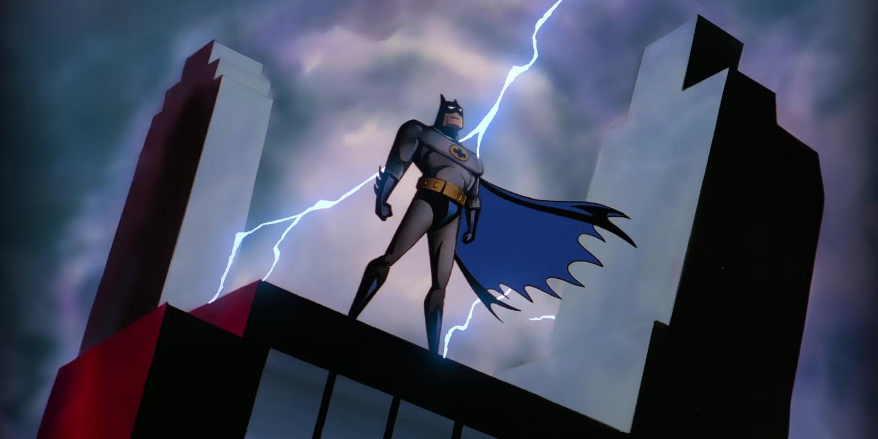تصویر آغازین Batman: The Animated Series از بتمن که روی پشت بام ایستاده، یک سریال ابرقهرمانی برای غیر طرفداران