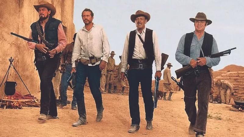 گروه در حال قدم زدن در The Wild Bunch، یکی از اولین بهترین وسترن های نوین