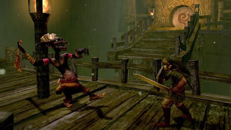 بهترین بازی های Zelda: اسکرین شات GameCube از Twilight Princess که لینک رو در حال رویارویی با دشمنی با شمشیر و سپر کشیده شده نشون میده