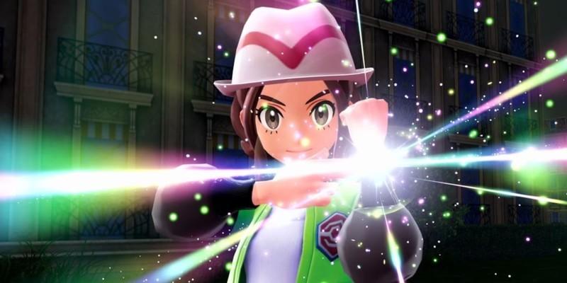 نقد و بررسی Pokémon Legends: Z-A: مربی در حال فعال کردن مچ بند Mega Evolution.