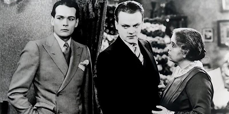 James Cagney glowers menacingly in a scene from The Public Enemy - فیلم گانگستری برای شروع
