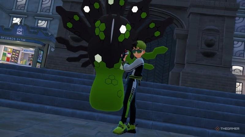 مربی که کنار Zygarde در بازی Pokemon Legends: Z-A با ست لباس Pokemon Legends: Z-A ژست گرفته است.