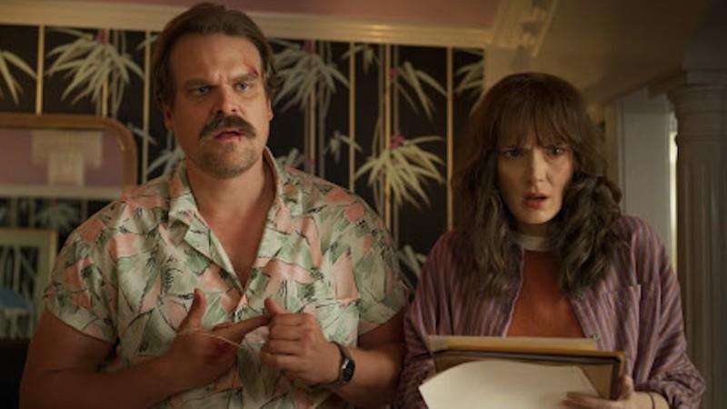 David Harbour's Hopper and Winona Ryder's Joyce look upset in Stranger Things Tales from '85
