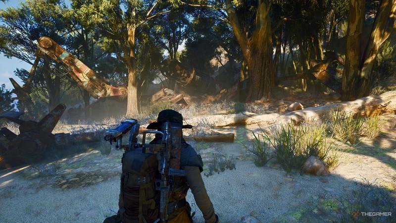 شخصیت بازی Arc Raiders در مقابل لاشه و خرابه ها ایستاده است. Arc Raiders رکورد Steam