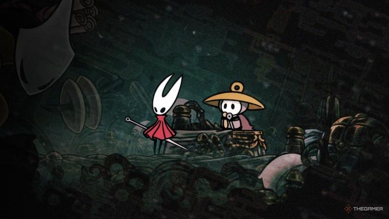 هورنت و شرما از Silksong در تاریکی با نقشه ای که آنها را احاطه کرده است. Silksong اخبار DLC