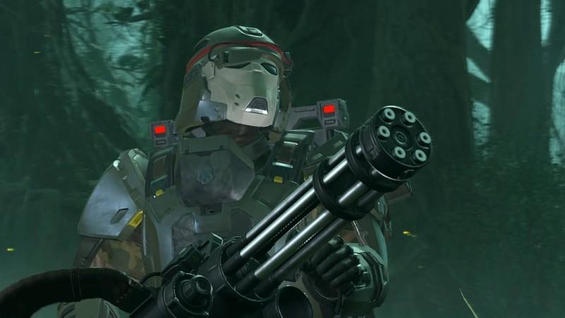 تصویر هل دایور جوایز Warbond Python Commandos Helldivers 2 که با Maxigun برافراشته ایستاده است