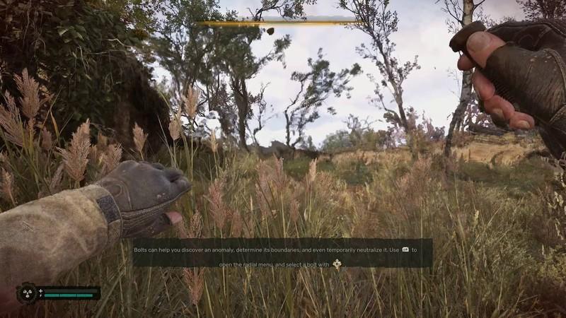 فرار از میدان ناهنجار Stalker 2: بازی Stalker 2 Heart of Chornobyl در حال پرتاب پیچ به سمت میدان ناهنجار برای فرار