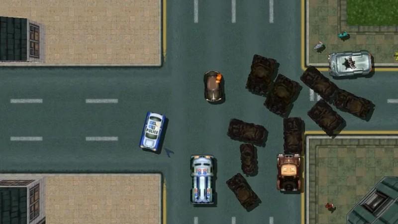 پلیس های GTA 2 دور بازیکن جمع شدن. این تصویری از دلایل چرا GTA آینده نگر نیست را نشان می دهد.