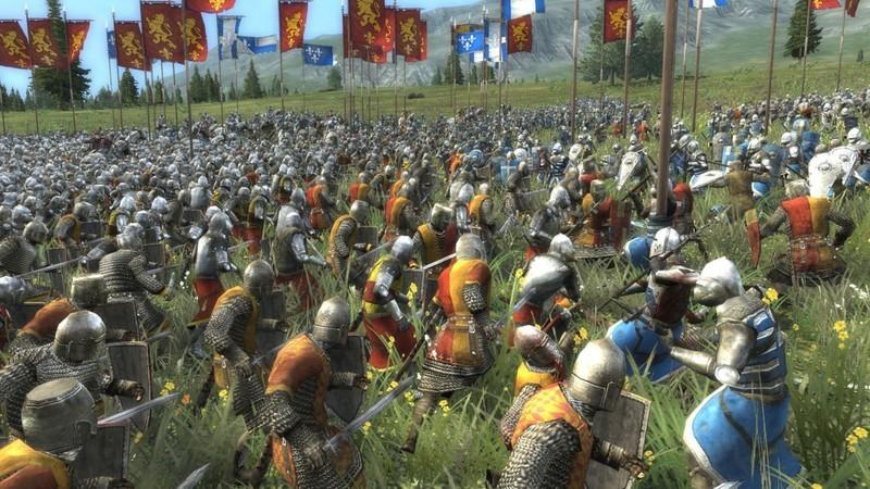 دو ارتش در حال نبرد در یک میدان نبرد در طول یکی از بهترین بازی های Total War، یعنی Total War: Medieval 2.