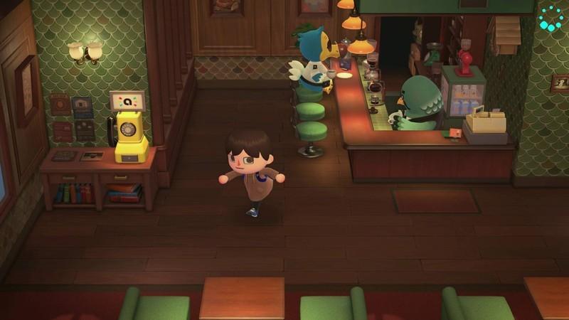 ساکن Animal Crossing New Horizons در کافه The Roost، آماده برای کار با amiibo در Animal Crossing با استفاده از تلفن آمیبو