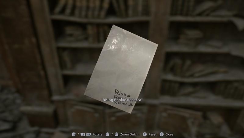 پشت یک عکس که کلمات Rising Rookie Rebecca روی آن نوشته شده، سرنخی برای Resident Evil Requiem باز کردن کیف