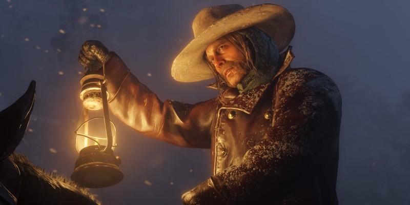 Red Dead Redemption 3 بدون Dan Houser: یکی از شخصیت های Red Dead Redemption 2 (مایکا) که یه فانوس رو توی برف بالا گرفته